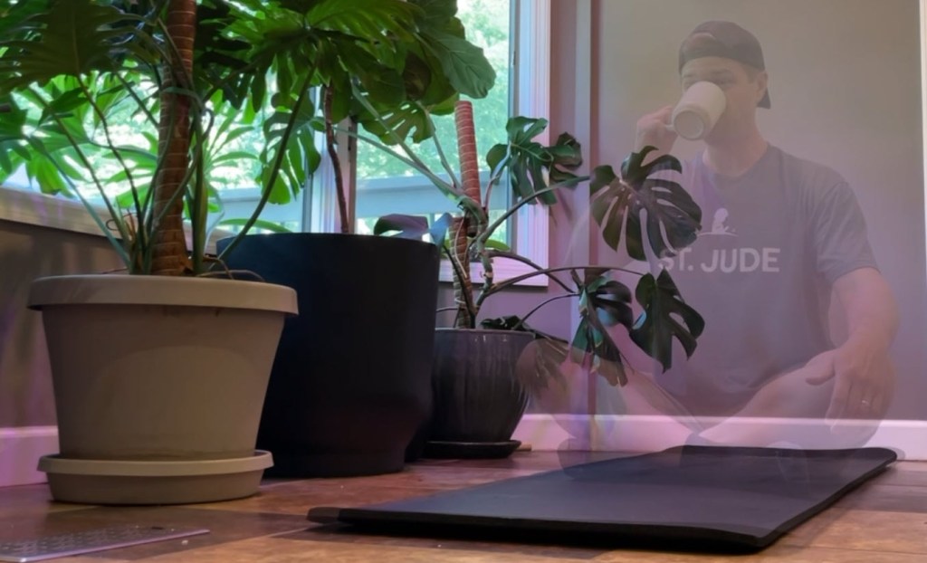 Improvement Dave drinks coffee getting ready to meditate. His body is transparent.