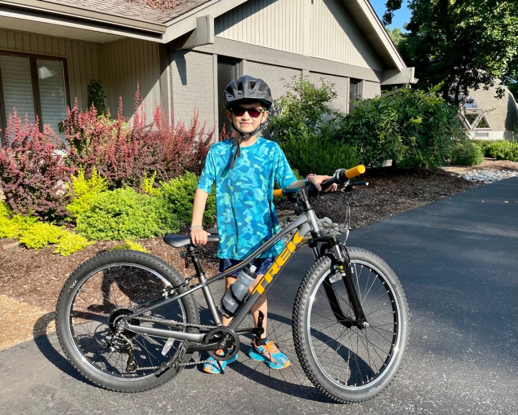 A picture of my son with his brand new TREK Pre-Caliber